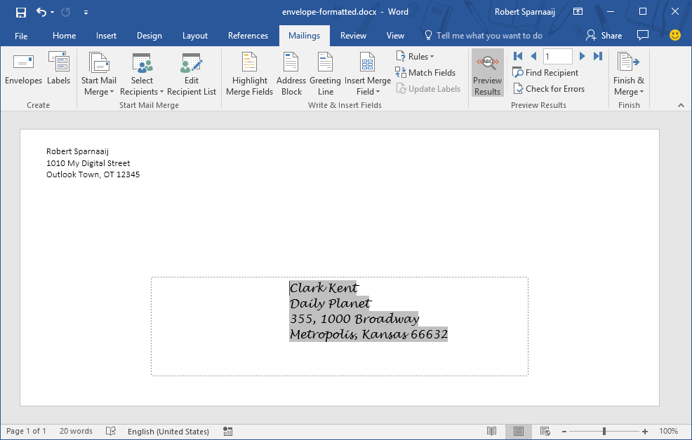 Envelope addressed with Outlook data via a Mail Merge. You can also see the outline of the “hidden” box of step 10. (click on image to enlarge)